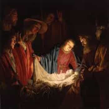Hombres junto al nacimiento de Jesús